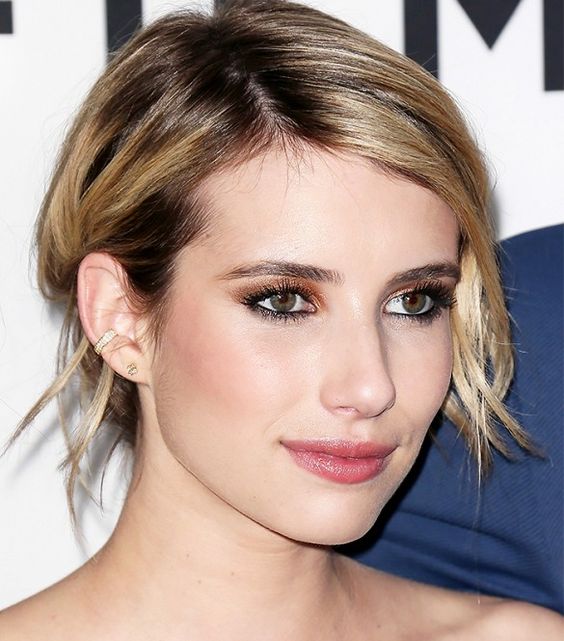 a rooty blonde long pixie haircut with a bit of waves is a cool and catchy idea for a relaxed look