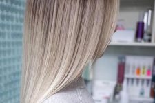 a soft and stylish ombre from darker root to silver champagne and icy blonde is a lovely and chic idea