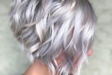 an asymmetrical wavy bob with a lot of volume is a gorgeous solution and the haircut is very trendy and popular