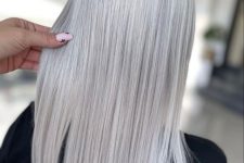 breathtaking long straight silver blonde hair with some volume is a chic and catchy idea to look modern and bold