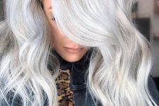fantastic long silver blonde hair with a lot of volume and waves is a gorgeous idea to rock, it looks adorable