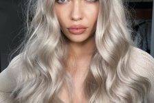 gorgeous long silver blonde locks with a bit of volume and waves look jaw-dropping, this is a stylish and cool solution