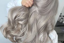 long and volumetric silver blonde hair with waves is a fab idea, it looks fantastic and very eye-catching