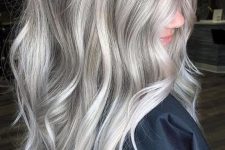 long brunette hair with silver blonde balayage, with a darker root and some delicate waves is a very romantic idea