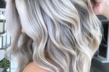 long hair with silver blonde balayage, volume and waves looks adorable, try it if you like cold shades