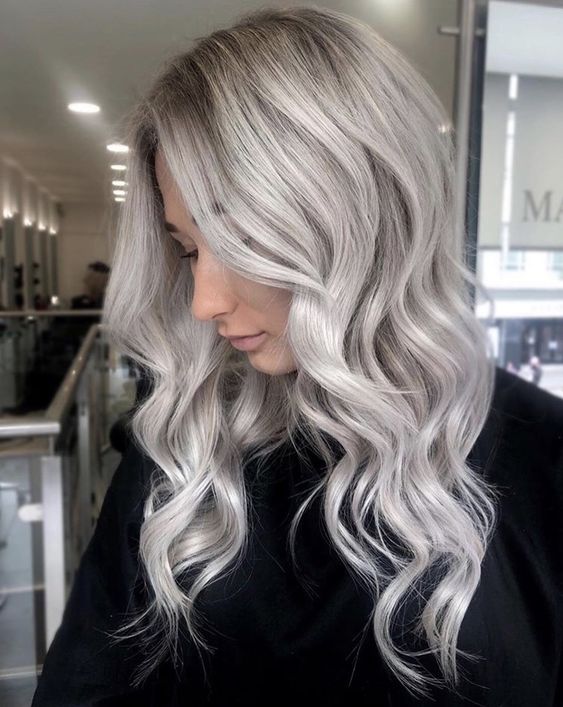 long silver blonde hair with volume and waves looks elegant, stylish and chic and inspires