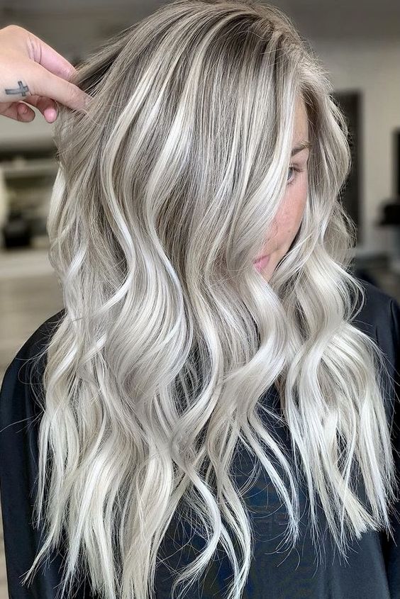 long silver blonde hair with waves and some volume is always a cool and spectacular idea