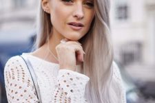 long straight silver blonde hair with a bit of volume is a stylish and catchy idea to rock right now