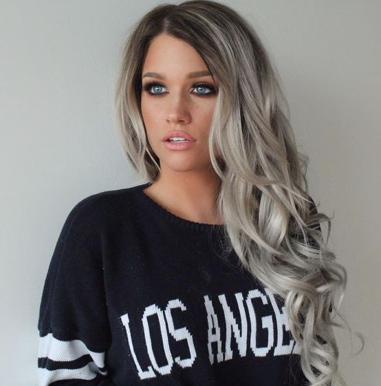 long volumetric hair with dark roots, silver blonde balayage and curls looks amazing and bold