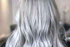 medium-length silver blonde hair with messy texture and a bit of volume is a catchy and cool solution