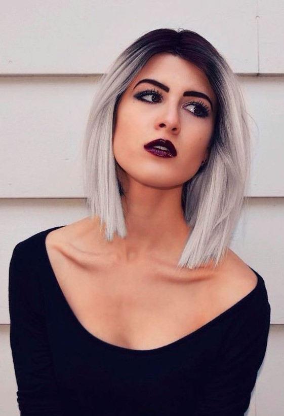 short black hair into silver blonde hair with a light ombre effect is a unique and extra bold idea