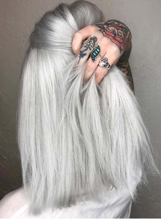 Shoulder length straight and volumetric silver blonde hair is a chic and catchy idea to rock