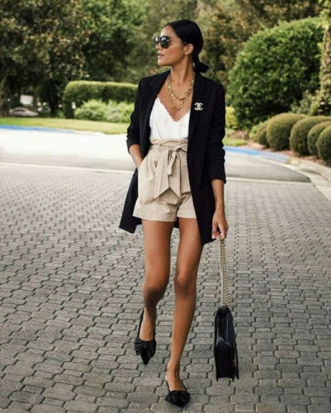 With black long blazer, white top, chain strap bag and black flat shoes