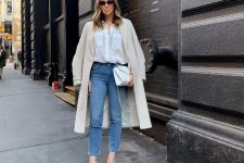 With crop jeans, white pumps, white chain strap bag and beige coat