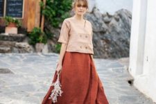 With pale pink loose shirt and beige leather shoes