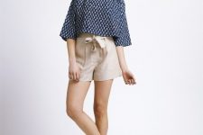 With printed crop shirt and golden flat shoes