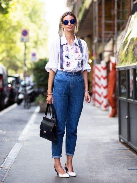 With printed shirt, black bag and white heeled shoes