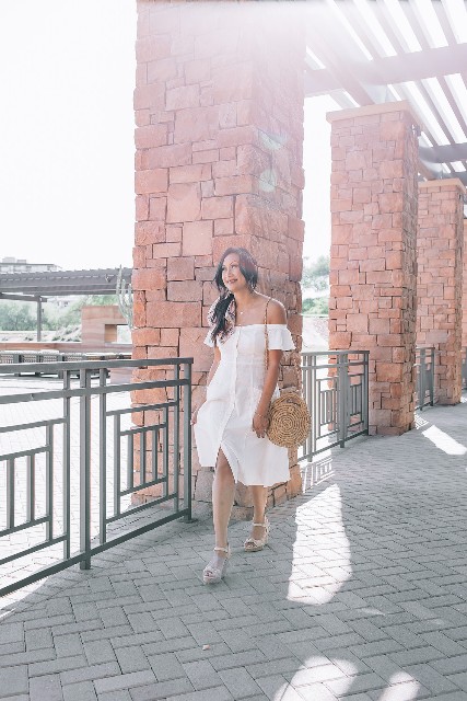 With straw rounded bag and beige ankle strap sandals