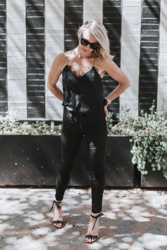 a black lingerie-style top, black skinnies, bow heels and sunglasses for a sexy first date look