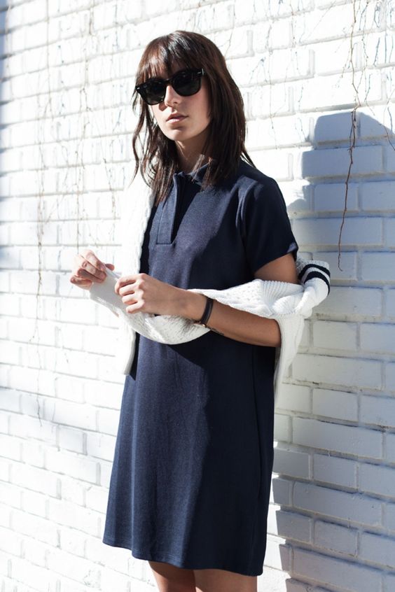 a navy polo mini dress and a white jumper are timeless classics for those summer to fall days