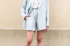 a pale blue windowpane short suit, a white blouse, white shoes for a stylish work look