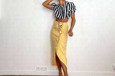 03 a black and white striped blouse with puff sleeves, a yellow high waisted midi skirt, nude heeled fliflops