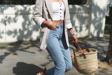 14 a white strapless crop top, blue jeans, espadrilles, a linen blazer and a straw tote for a chic summer look