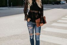 With distressed skinny jeans, beige ankle strap high heels and brown clutch