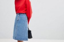With red sweatshirt, black bag and black lace up low heeled sandals