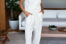 a beautiful linen set with a tied strap top and pants, white espadrilles, statement earrings for summer