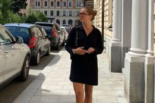 a black linen mini shirtdress, black dad sandals and a black bag for a simple and cool summer work look