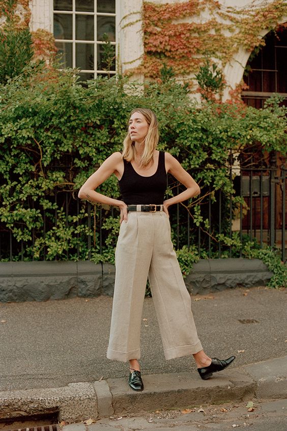 a black thick strap top, cropped linen pants, a black belt and black Oxford shoes for a hot summer day