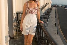 a floral top, white high waisted linen shorts, black heels for a very romantic look