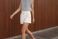 a grey accented shoulder top, white linen shorts and brown birkenstocks for a lovely casual look