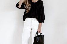 an elegant summer work outfit with a black top, white jeans, black birkenstocks and a black bag is a fresh take on classics