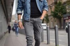 04 a cozy everyday look with a black turtleneck, grey jeans, a blue denim jacket, black sneakers and a cool watch