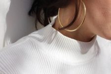 09 oversized yellow gold statement hoop earrings are a cool solution for any party look and will be bold with many outfits