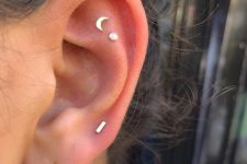 11 minimalist ear styling with a double lobe and double flat piercings, with a hoop and chic studs is a lovely idea to rock