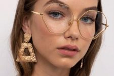 13 delicate hexagonal eyeglasses in a thin gold frame is a veyr chic and bold idea if you wanna make a statement