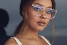 13 oversized square eyeglasses in a clear frame is a bold and fashion-forward accessory for glasses wearers