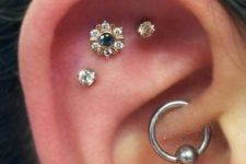 14 a triple flat piercing and a daith one styled with gorgeous gold studs and a simple hoop earring is a lovely idea