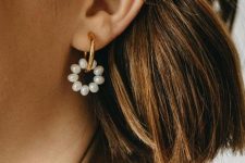 15 a catchy gold hoop and pearl hoop earring is a very chic and stylish idea that comprises two trends in one