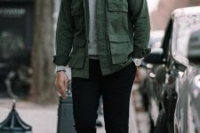 17 a grey turtleneck, black trousers, black shoes, a green army jacket for a super stylish fall look