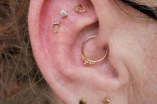 21 creative stacked piercings – stacked lobe ones, a daith and a triple flat piercing are a lovely idea for a modern girl