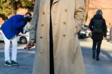 31 a black turtleneck, trousers, shoes and a tan trench coat for a stylish and chic look in the fall