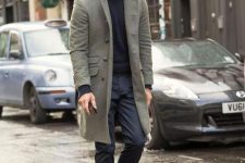 34 a navy jumper, navy trousers, a grey coat and rust-colored boots for a bold color accent