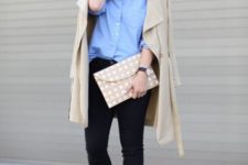 With beige coat, black trousers, polka dot clutch and white pumps
