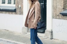 With brown loose blazer, cropped jeans and black leather bag
