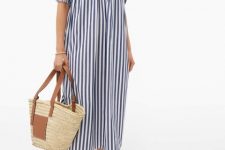 With golden flat sandals and beige and brown tote bag