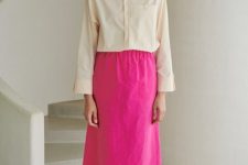 With pink midi skirt and white flat sandals